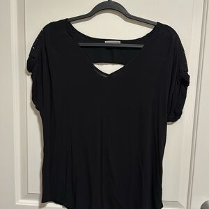 Women’s black blouse - black crystals on back with v cutout.